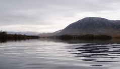 Lough Inagh , the Lough Inagh Lodge in the distance